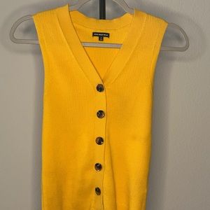 Who what wear summer vest in yellow. Size Small with cute brown buttons